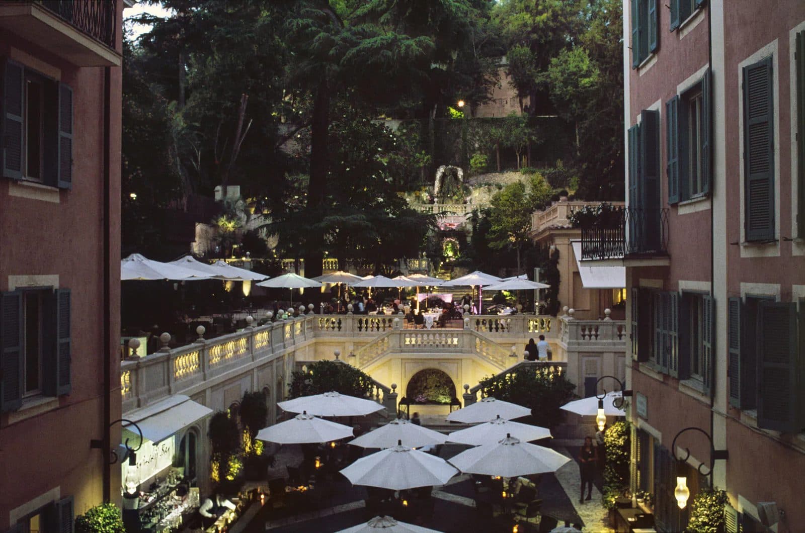 The Hotel de Russie courtyard in Rome in the evening