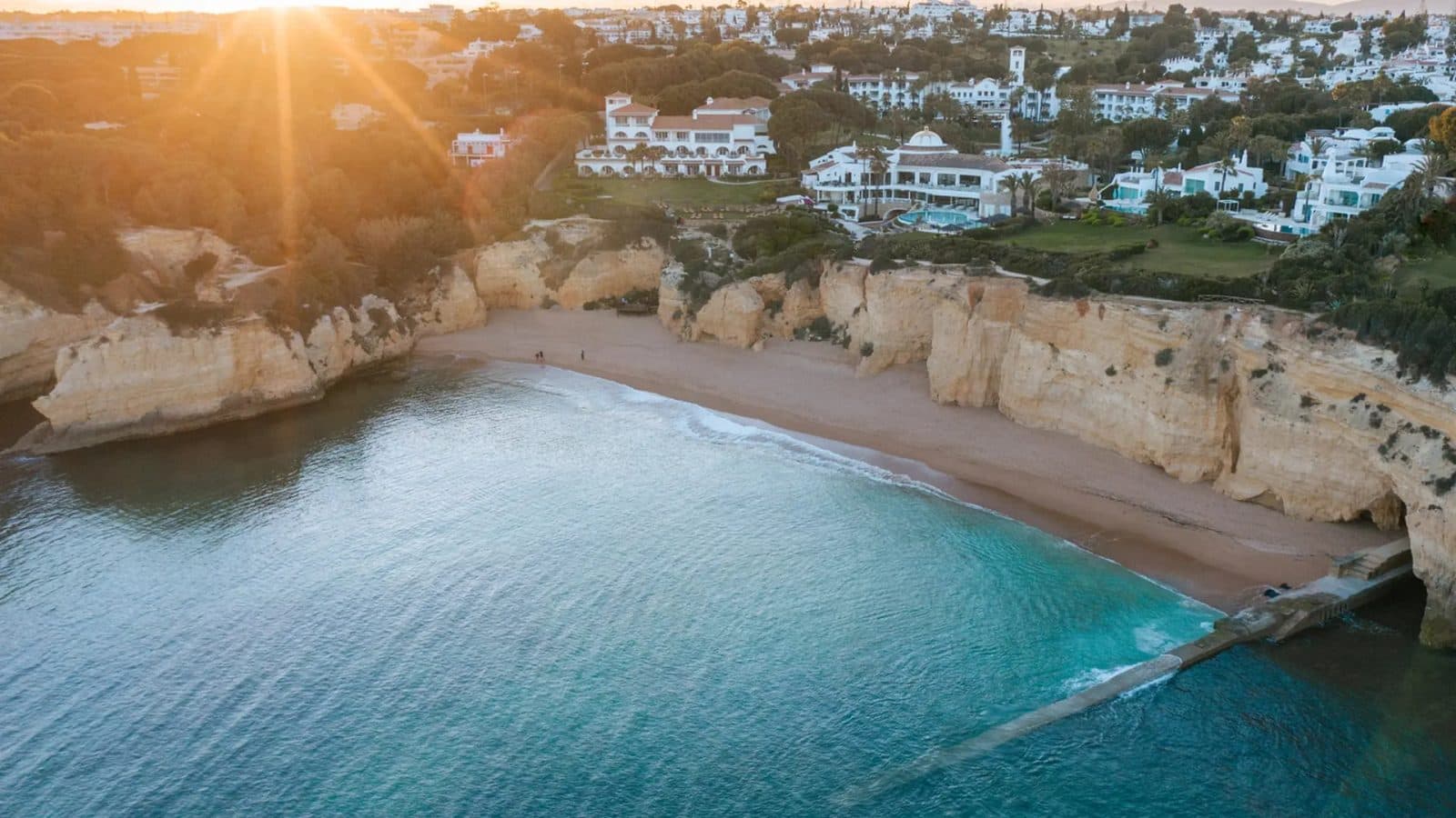 Vila Vita Parc beach and coastline at sunset