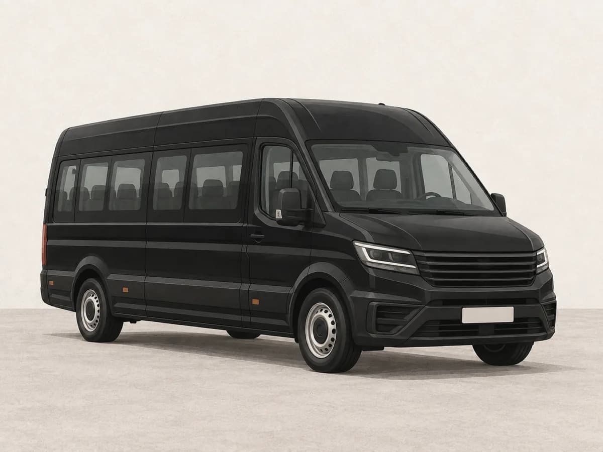 A black minibus against a pale background